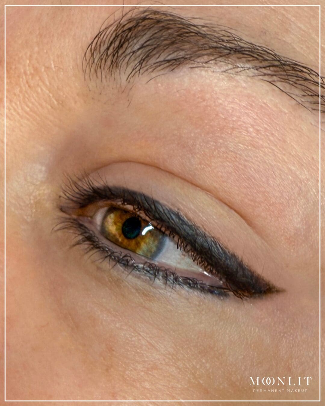Close-up of winged permanent eyeliner tattoo creating defined eye shape and long-lasting makeup effect, professional cosmetic tattoo work by Salt Lake City Utah PMU artist