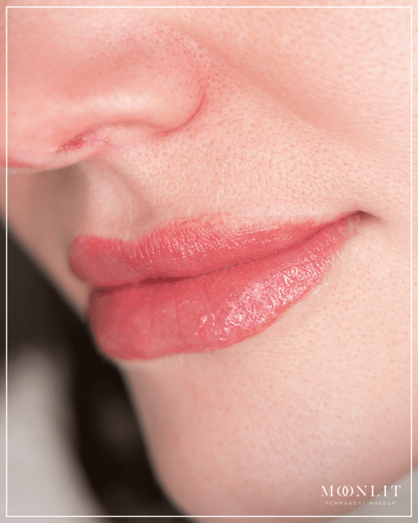 Soft natural pink lip blush tattoo with subtle enhancement, hydrated lips with even tone and smooth texture, no makeup makeup look lip blush by Salt Lake City PMU artist in Salt Lake City Utah